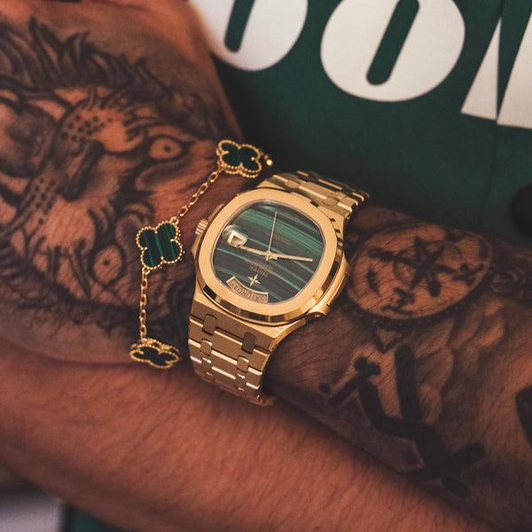 The Holy Trinity in 18K Gold with Malachite dial